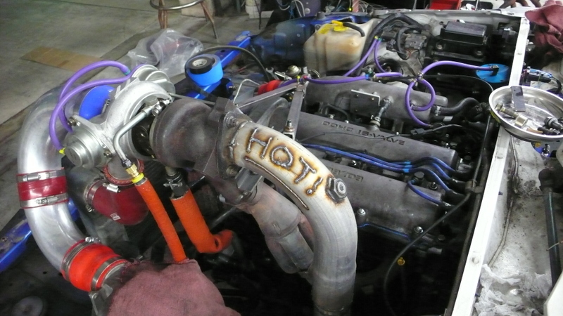 Illustration for article titled Eyesore Racing's Ghettocharged Miata Fears No Turbocharged Peugeot Surrender Monkeys!